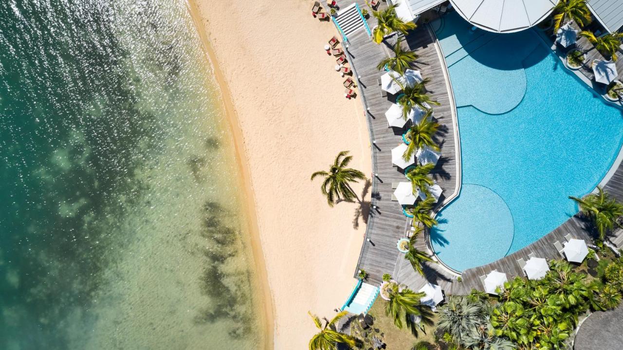 Lux* Grand Gaube Resort & Villas Esterno foto Aerial view of the pool and beach at the Sheraton Maldives Resort & Spa